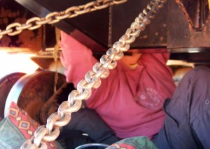 Marion Lester locked on to a to on to a truck carrying a drilling machine - image from Save the Kimberley Facebook